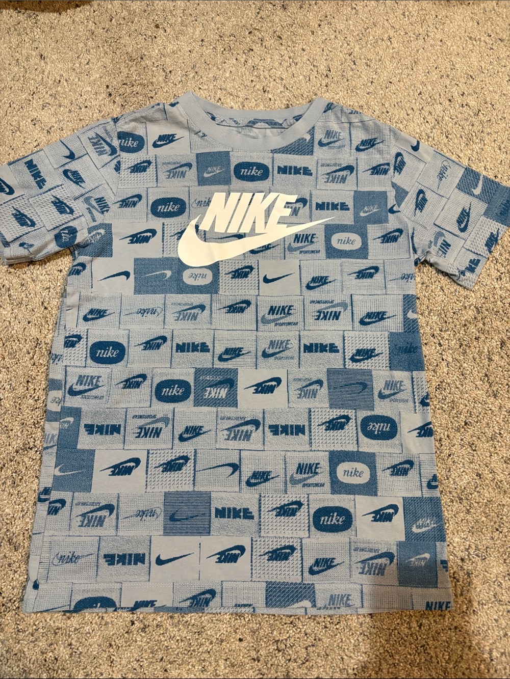 Nike Light Blue All-Over Logo Short Sleeve Tee
